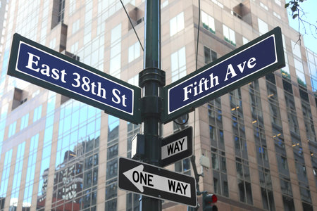 Street names intersection East 38th Street Fifth Avenue New York City USA