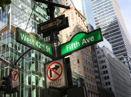 new york intersection fifth ave west 42nd st signs skyscrapers in the backgroundの写真素材