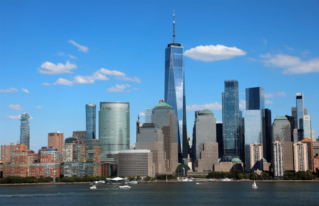 new york city panorama viewed from across the hudson with the one world trade center tower and...