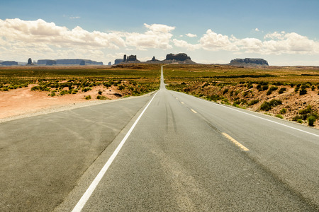 This is the point where Forrest gump, in the movie interrupted his race. From this location you can see the monument valley in the distance and the long road that leads to itの写真素材