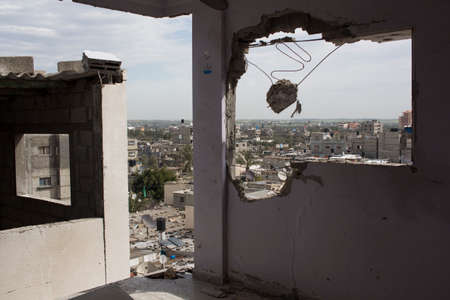 Gaza Strip, Gaza City: a girls bedroom was hit by a cannon shot that fractured her legsのeditorial素材