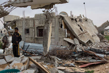Gaza Strip, homes destroyed by Israeli bombing around Khan Yunisのeditorial素材