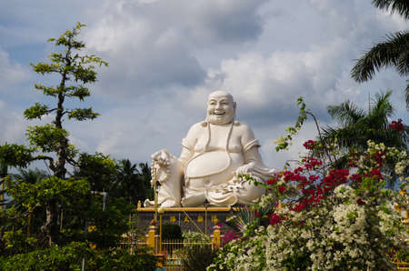 Gigantic Sitting Buddha at the Vinh Tranh Pagoda in My Tho, the Mekong Deltaの写真素材