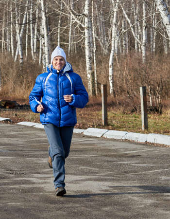 Sport in a beautiful, dense forest is very useful for healthの写真素材