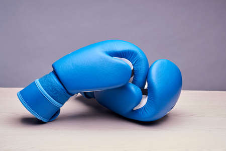 Blue boxing glovesの写真素材