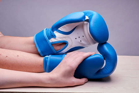 Striking power is achieved by reducing the padding of the gloves of the athlete, which increases the trauma of the handsの写真素材