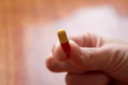 yellow and red pill obtained by special shaping of the masses