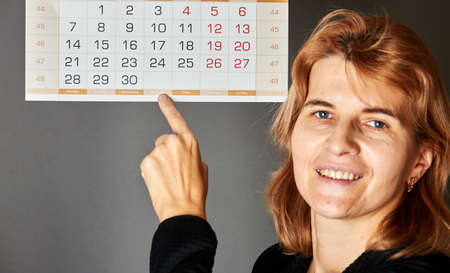 Man showing calendarの写真素材