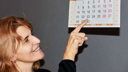 Man showing calendarの写真素材