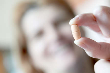 Tablets in the hand of the doctorの写真素材