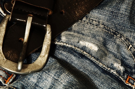 Old jeans and black belt.の写真素材