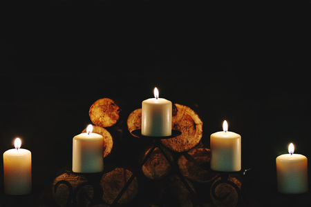 Burning in the dark candlesの写真素材
