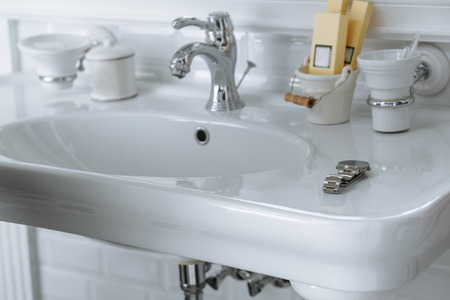 Bathroom sink at restroom hotel interior , apartment,の写真素材