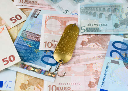 Fishing bait on money - motivation symbolの写真素材