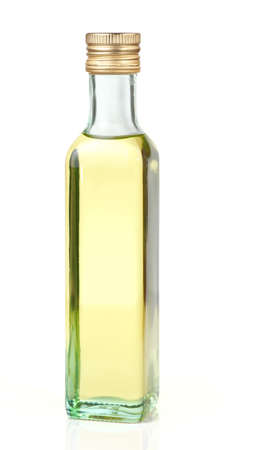 Grape seed oil in glass bottle, isolatedの写真素材