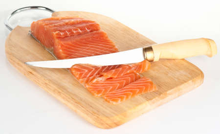 Salmon sliced with Finnish fillet knifeの写真素材