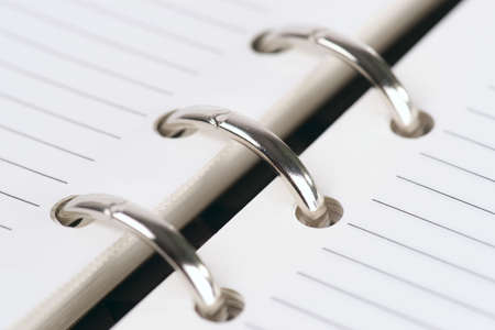 Folder bookbinder, shallow focus, macro shot, focus is on the second bindの写真素材