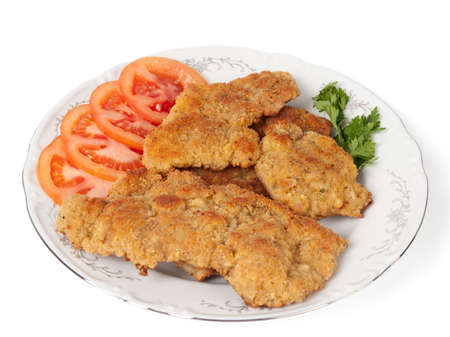 Schnitzels with tomato and parsleyの写真素材