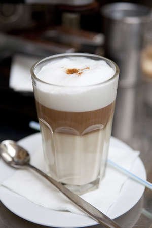 Glass of latte coffee, shallow DOFの写真素材