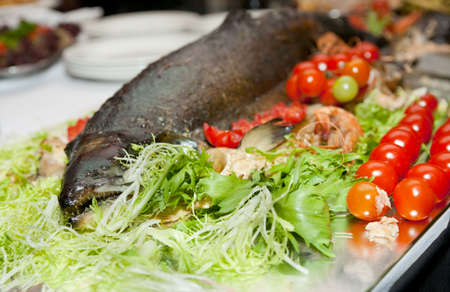 Deep fried trout on banquet tableの写真素材