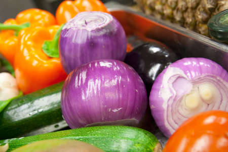 Variety of vegetables - onions, bel peppers and courgettes , shallow focusの写真素材