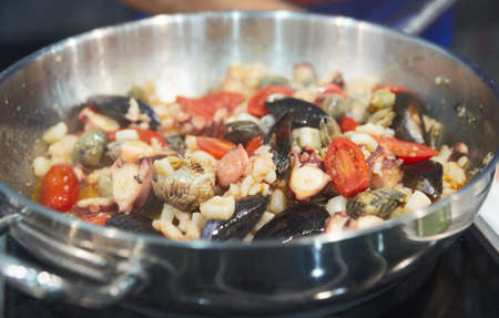 Seafood on hot pan - part of Italian national cuisineの写真素材