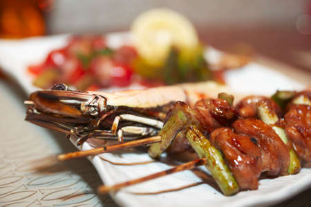 Grilled jumbo prawn and chicken fillet, japanese style foodの写真素材