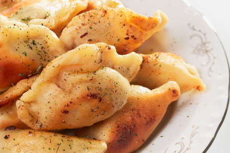 Fried ravioli in plate, close-upの写真素材