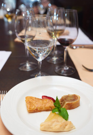 Dessert and drinks on a restaurant tableの写真素材