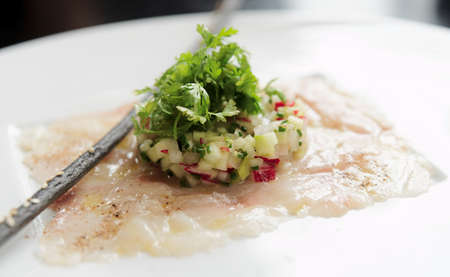 Seabass carpaccio with vegetable tartareの写真素材