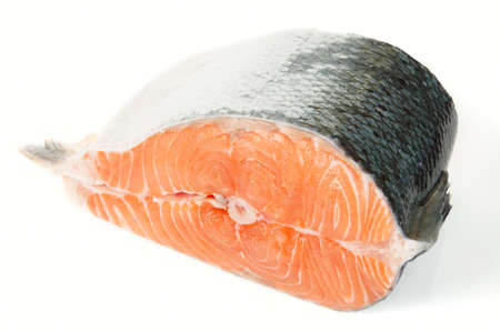 Piece of fresh salmon isolated on white bacgroundの写真素材