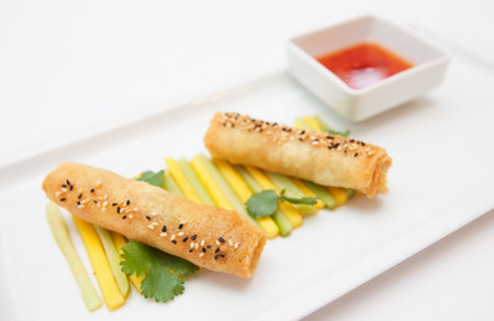 Spring rolls on porcelain tableの写真素材