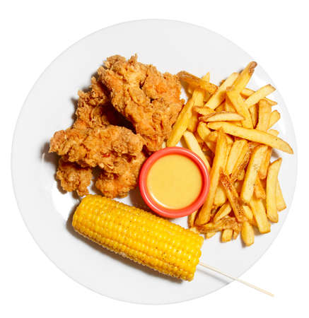 Tex-mex dish - hot chicken, potato chips and sweet corn isolated with clipping pathの写真素材