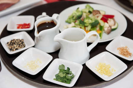 Tray with various food ingredients ready for cookingの写真素材