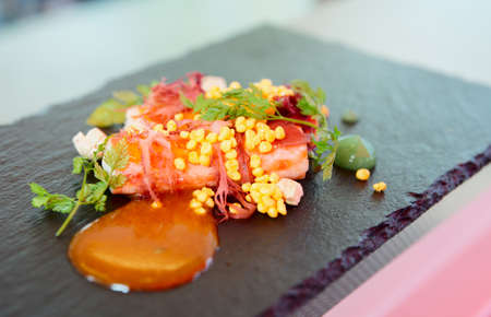 Chili crab cooked in modern way with molecular egg yolk caviarの写真素材