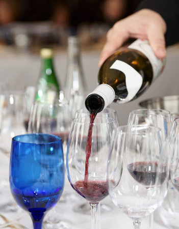 Pouring wine during a winetasting event
