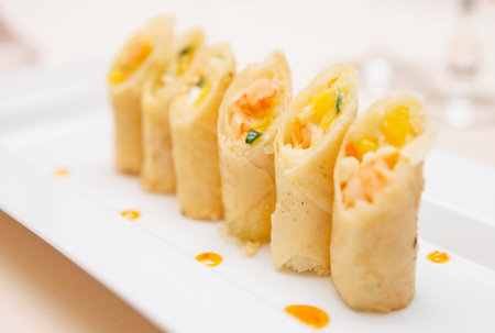 Spring rolls on plate, close-up