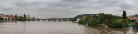 Panorama of Prague flood 2013, gloomy overcast dayの写真素材