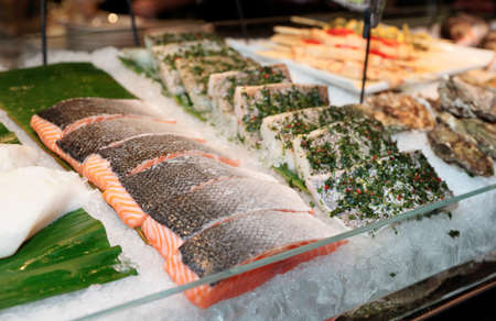Fish steaks on cooled market displayの写真素材