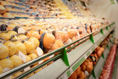 Shelf with citrus fruits, TM's removed, price tags left in place and contain no copyright.の写真素材