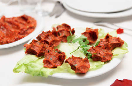 Beef tartare with cayenne pepper in plateの写真素材
