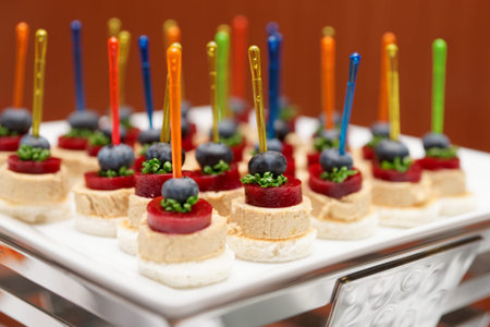 Snack of foie gras and marmalade on platterの写真素材