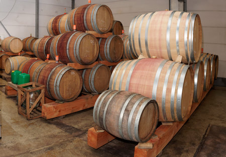 Oak casks with Pinot Noir (PN) red wine