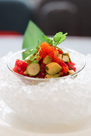 Tuna and avocado tartare served on ice