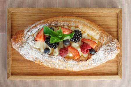 Georgian cheese pie with berries shot from above