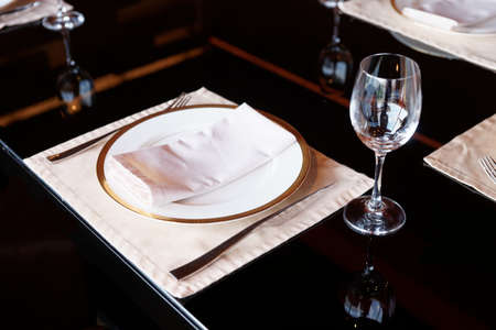 Table arrangement in a restaurantの写真素材