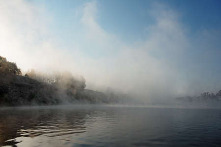 Dense fog on rver, sunriseの写真素材