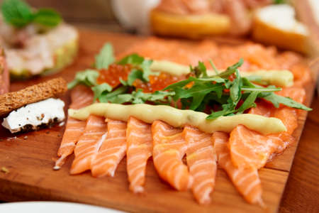 Salmon appetizer on plate, close-up shotの写真素材