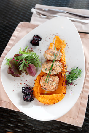 White meat patty cakes with pumpkin mash