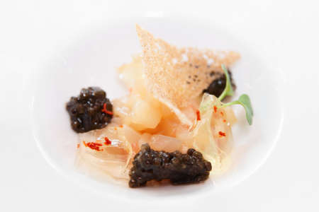 Small gourmet dish with black caviar, close-upの写真素材